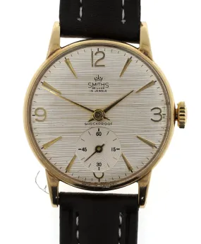 DELUXE SMITHS 9CT GOLD BRITISH RAIL WRISTWATCH IN GOOD CONDITION WITH PATTERNED DIAL 1966