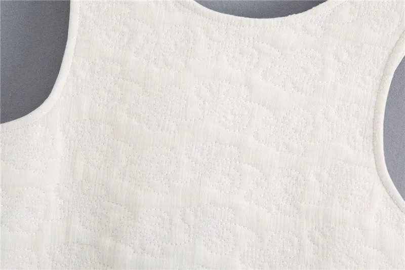 WAVY HEM QUILTED TOP